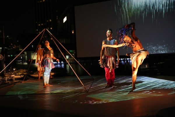 A group of dances around a tepee structure