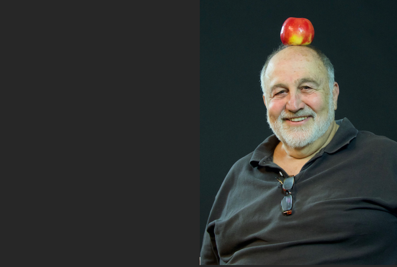 Jack Grapes with apple on head. Photo by Alexis Rhone Fancher