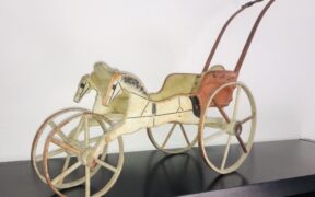 Antique doll carriage, 1877