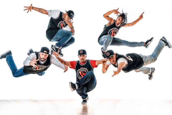 Hip hop dancers seemingly suspended in air