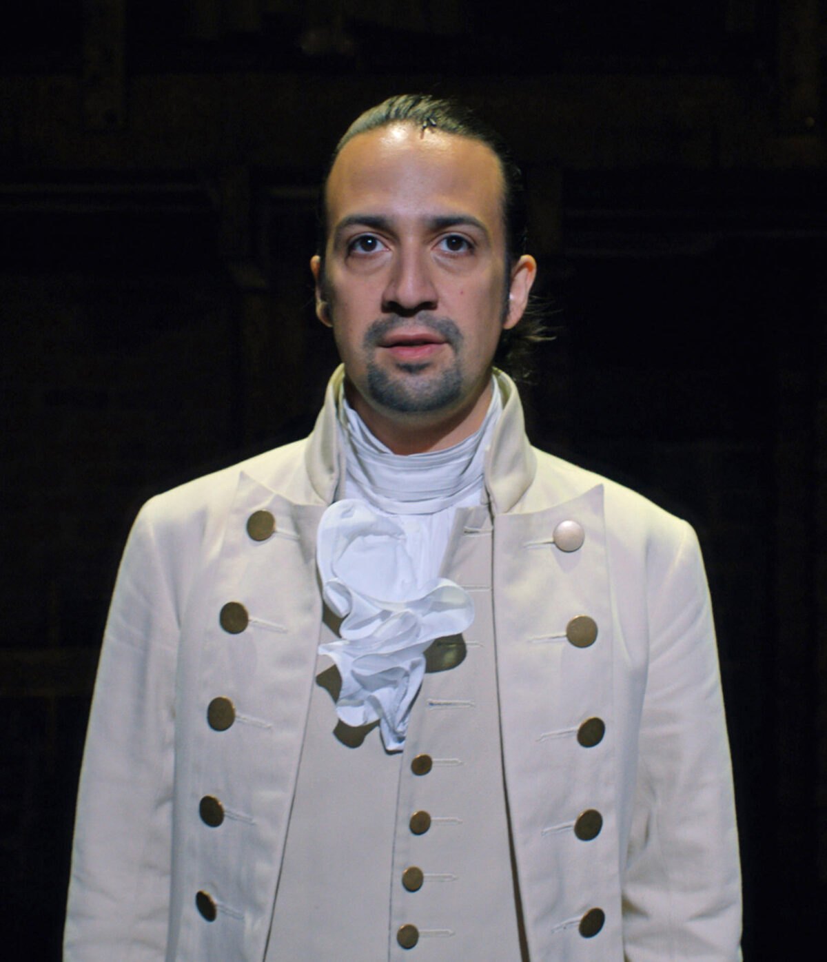This is Lin-Manuel Miranda in his iconic role, familiar outfit, as Alexander Hamilton from his musical Hamilton.