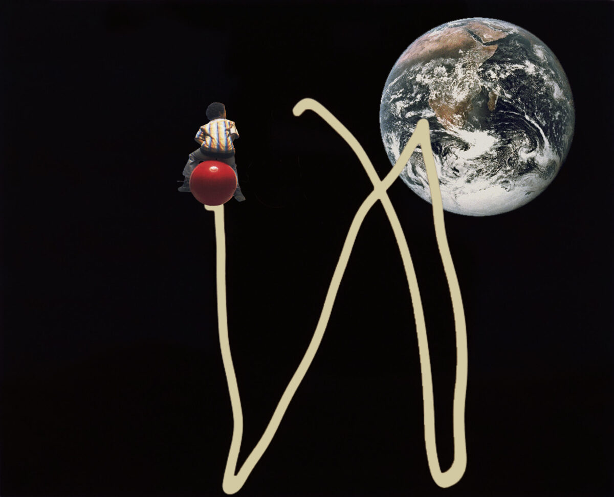 A little boy sits on a large red ball atop several verticle white lines on a black background. He looks over his shoulder at a giant image of Earth as seen from outer space.