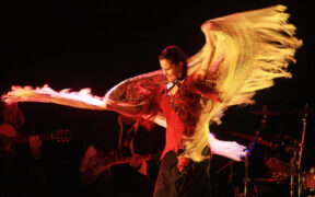 Flamenco dancer Maria Bermudez swirls a yellow shawl