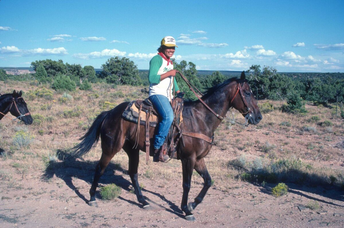 Navajo rider on horseback. Canyon De Chelly, Arizona