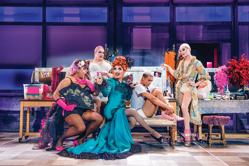 Drag queens surround the main character, Jamie, in Everybody's Talking About Jamie.