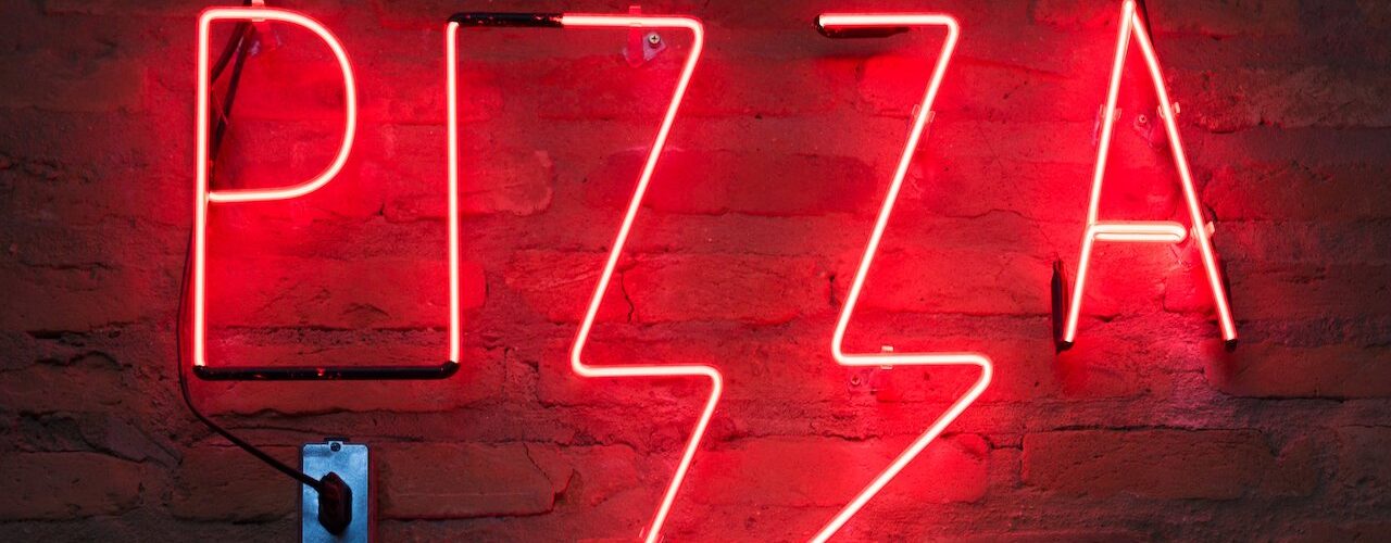 red neon pizza sign