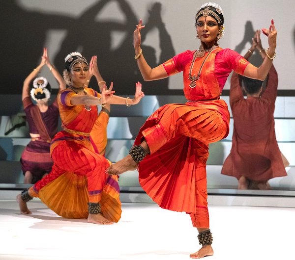 Dancers in red saris 