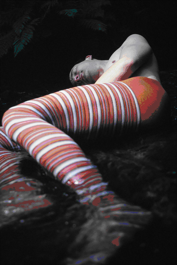A dancer in striped tights