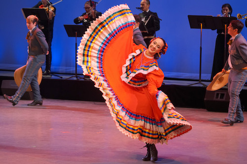 Mexican folkloric dancer in red dress