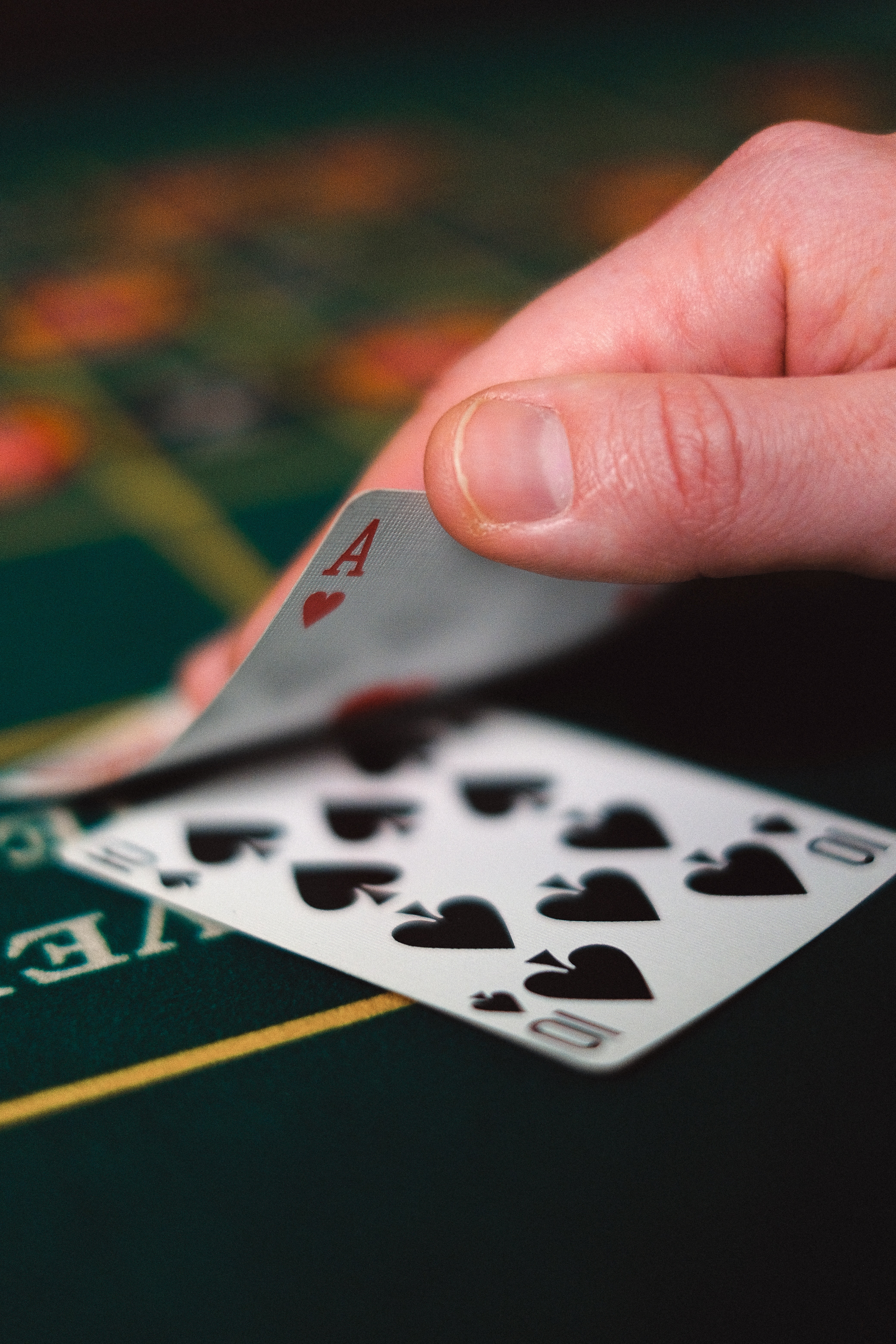 Photo by Anna Shvets: https://www.pexels.com/photo/a-person-holding-gaming-cards-6664195/