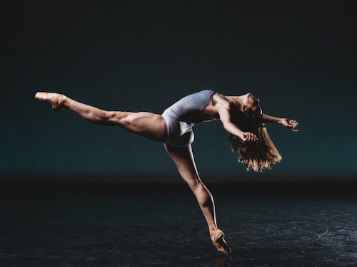A dancer lays out