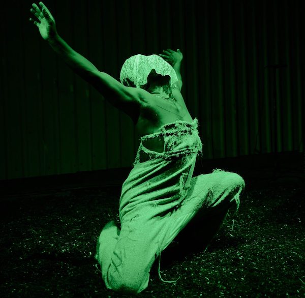 Dancer in green light