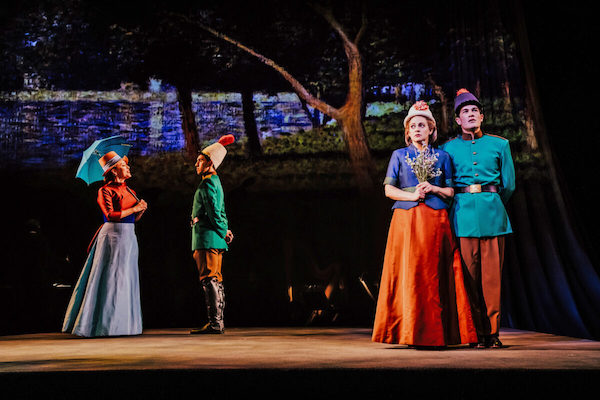 Four figures in 19th century garb in Sunday in the Park with George by Stephen Sondheim