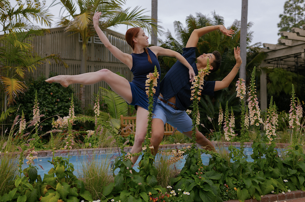 Two dancers in a garden