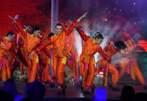 Dancers in orange costumes