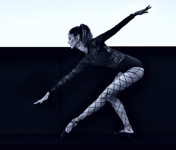 A dancer in fishnets takes a bow